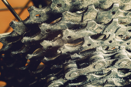 Details of a modern sport bicycle, closeup view of back wheel, chain and head.の写真素材