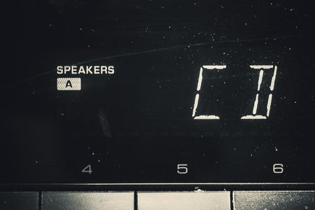 Details of an old radio receiver, closeup view on display, CD and speakers control.の写真素材