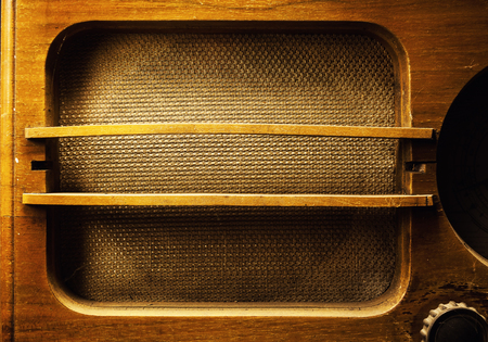 Design of an old wooden radio device. Names of European towns written in Cyrillic as radio stations. Balkan retro style from first half of 20th century.の写真素材