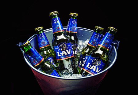 Cacak, Serbia - March 30, 2016: Six bottles of Lav beer in bucket, served for group of people.のeditorial素材