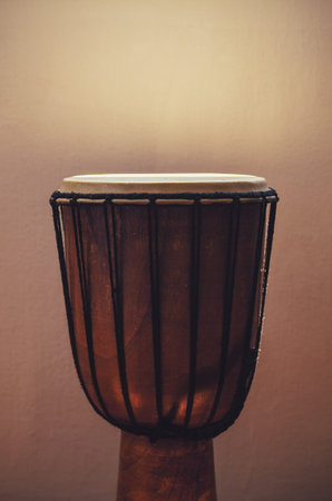 Old wooden brown djembe, percussion instrument of Africa, Balkan and East.の写真素材