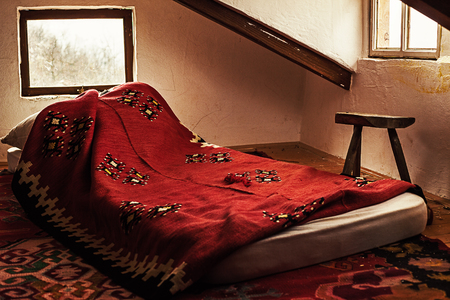 Loft interior of an old Serbian wooden house. の写真素材
