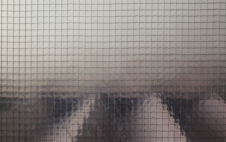 Details of armored glass, closeup view.の写真素材