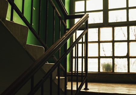 Details of an old building stairways and window, retro look.の写真素材