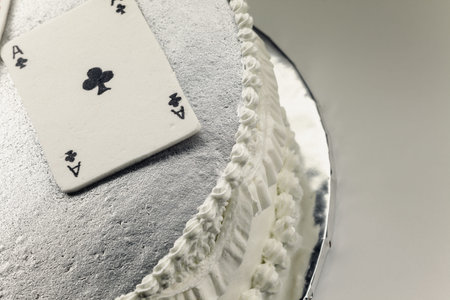 Decoration of a cake, gambling cards made of fondant.