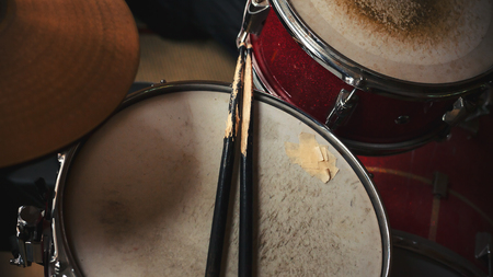 Set of old used red drums, closeup view.の写真素材