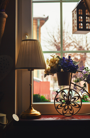 Decorative objects in front of window, indoor details. の写真素材