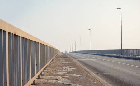 Bridge details, morning winter time, one car in the far.の写真素材