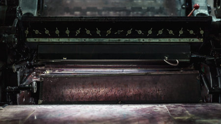 Closeup view of parts of an old printing offset machine.  