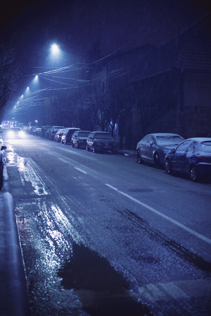 Outdoors of small Balkan town during winter, night scene. Cacak city, Serbia.の写真素材