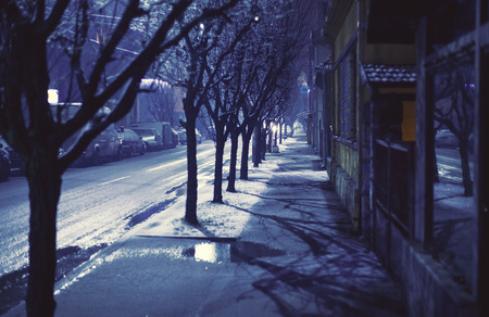Outdoors of small Balkan town during winter, night scene. Cacak city, Serbia.の写真素材