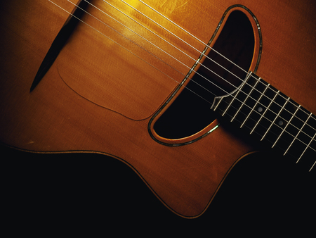 Gypsy acoustic guitar body and neck, closeup view.の写真素材