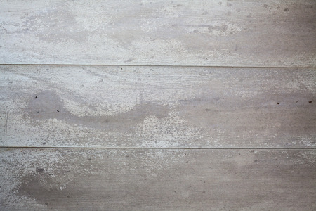 Texture details of an old dusty wooden floor.の写真素材