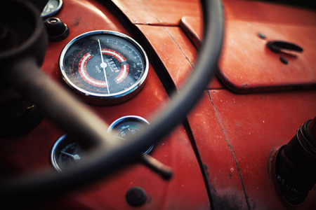 Closeup view on tractor's seat and steering wheel.の写真素材