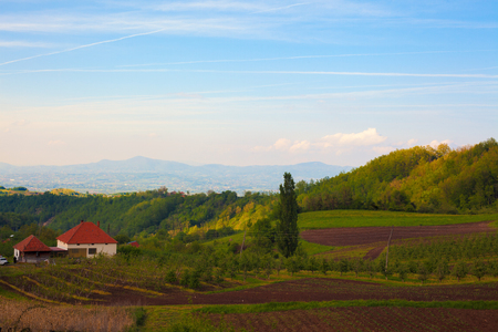 Serbian village landscape, spring time during day.の写真素材