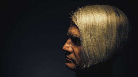 Portrait of a middle aged man with interesting haircut.の写真素材