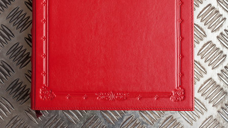 Closeup view of red leather book of impressions.の写真素材