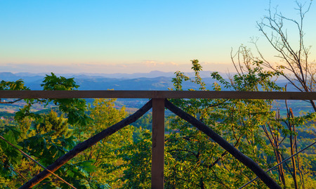 View from wooden terrace, Serbian village landscape.の写真素材