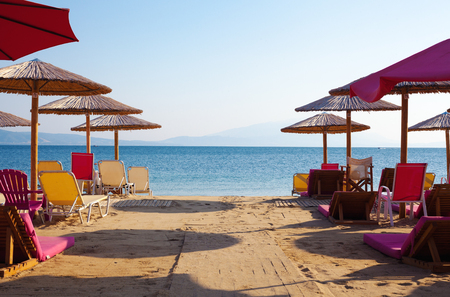 On the beach in Greece, early morning summer season.の写真素材