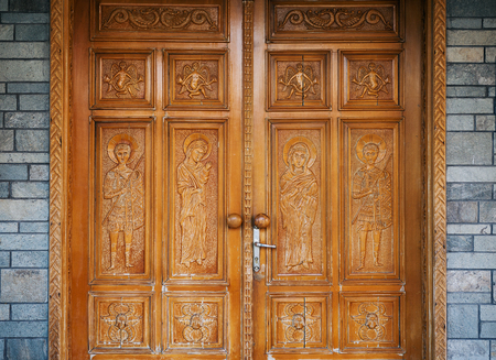 Orthodox church in Greece, details of big wooden ornamented doors. の写真素材
