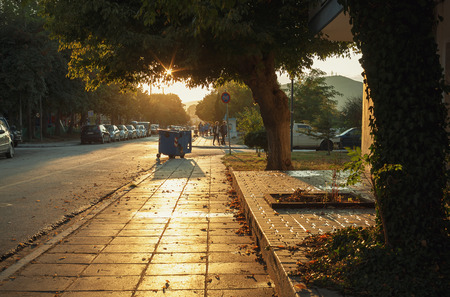 Stavros, Greece - September 05, 2017: View from sidewalk of main street during sunset.のeditorial素材