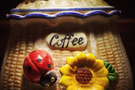 Closeup view on coffee title, part of interesting decorative old bowl. の写真素材