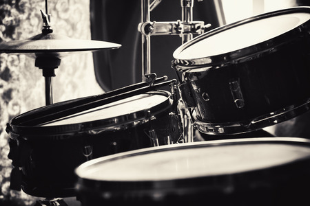 Details of an old dusty and retro drum set.の写真素材
