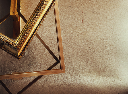 Abstract composition of various wooden decorative frames for pictures in workshop. の写真素材