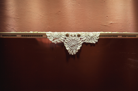 Abstract composition, old embroidery as decoration on old household stove. の写真素材