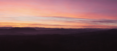 Sunset at the beginning of winter in Serbia. Central Serbia with its meadows, hills and forests.の写真素材