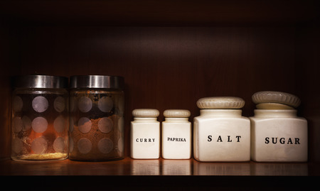 Small bottles of ceramic and glass with ingredients, part of a kitchen accessories.の写真素材