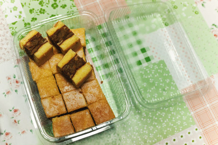 Details of homemade cakes in plastic transparent package.
