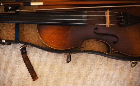 Details of an old and dusty violin from Czechoslovakia.の写真素材