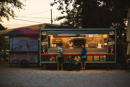Cacak, Serbia - July 17, 2018: Bakery small shops in city park besides the river Morava, summer...