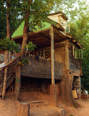 Closeup view of old wooden forest house, classical architectural style from Serbia from past.の写真素材