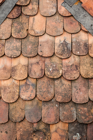 Texture of an old weathered roof tiles.の写真素材