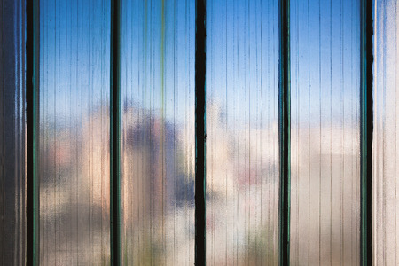 Texture details of blurry reinforced glass, close-up view.の写真素材