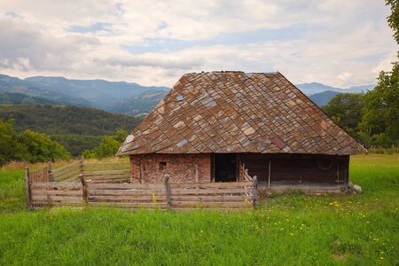 Exterior of a sheep house, during summer day.の写真素材