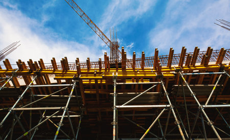 Abstract composition of building buildings, big crane and construction.