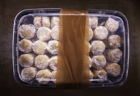 Box of sweet and tasty domestic cakes with jam, traditional food from Serbia called Vanilice.の写真素材