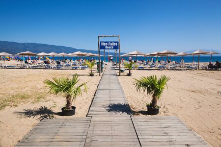 Stavros, Greece - September 2, 2019: Beautiful Neo Faliro Beach, one of beaches in Stavros during summer season.のeditorial素材