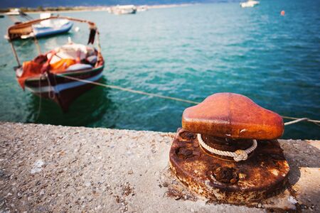 Dock details, parked boat during day.の写真素材