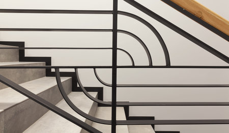 Closeup view of modern staircase metal fence.