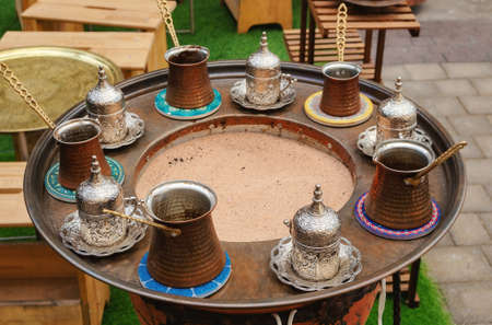 Dubai, United Arab Emirates - January 21, 2022: Dubai Marina details, coffee dishes and big street ashtray.のeditorial素材