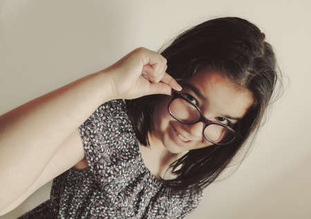 Small girl posing, facial expression.の写真素材