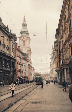 Graz, Austria - April 26, 2022: Graz downtown streets and sidewalks during day in April.のeditorial素材