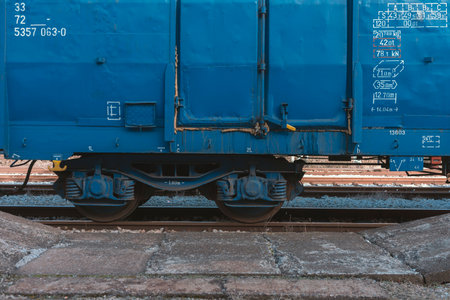 Details of a blue freight train parked in the station.の写真素材