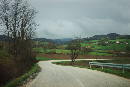 Intercity road in central Serbia during a rainy day in early spring.の写真素材