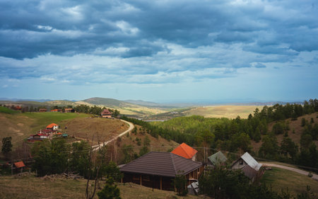 Mountain road, nature of Zlatibor in Serbia, beginning of spring on a cloudy day.の写真素材