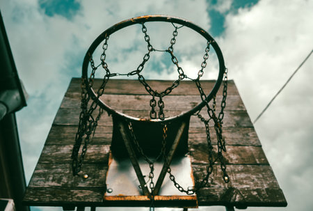Old wooden basket with metal mesh, handmade, detail from the yard.の写真素材